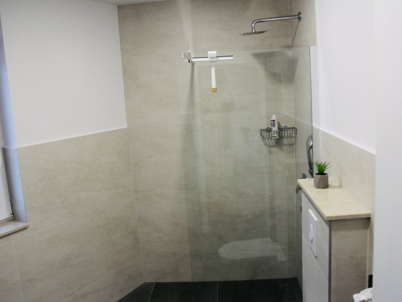 Walk-in shower in one of the villa's five bathrooms